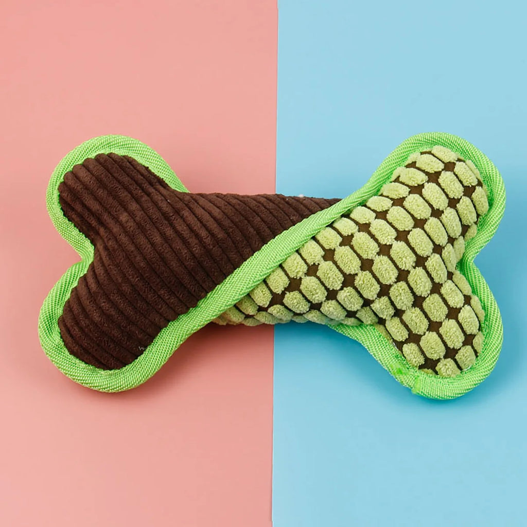 Bone shaped dog toy with squeaker