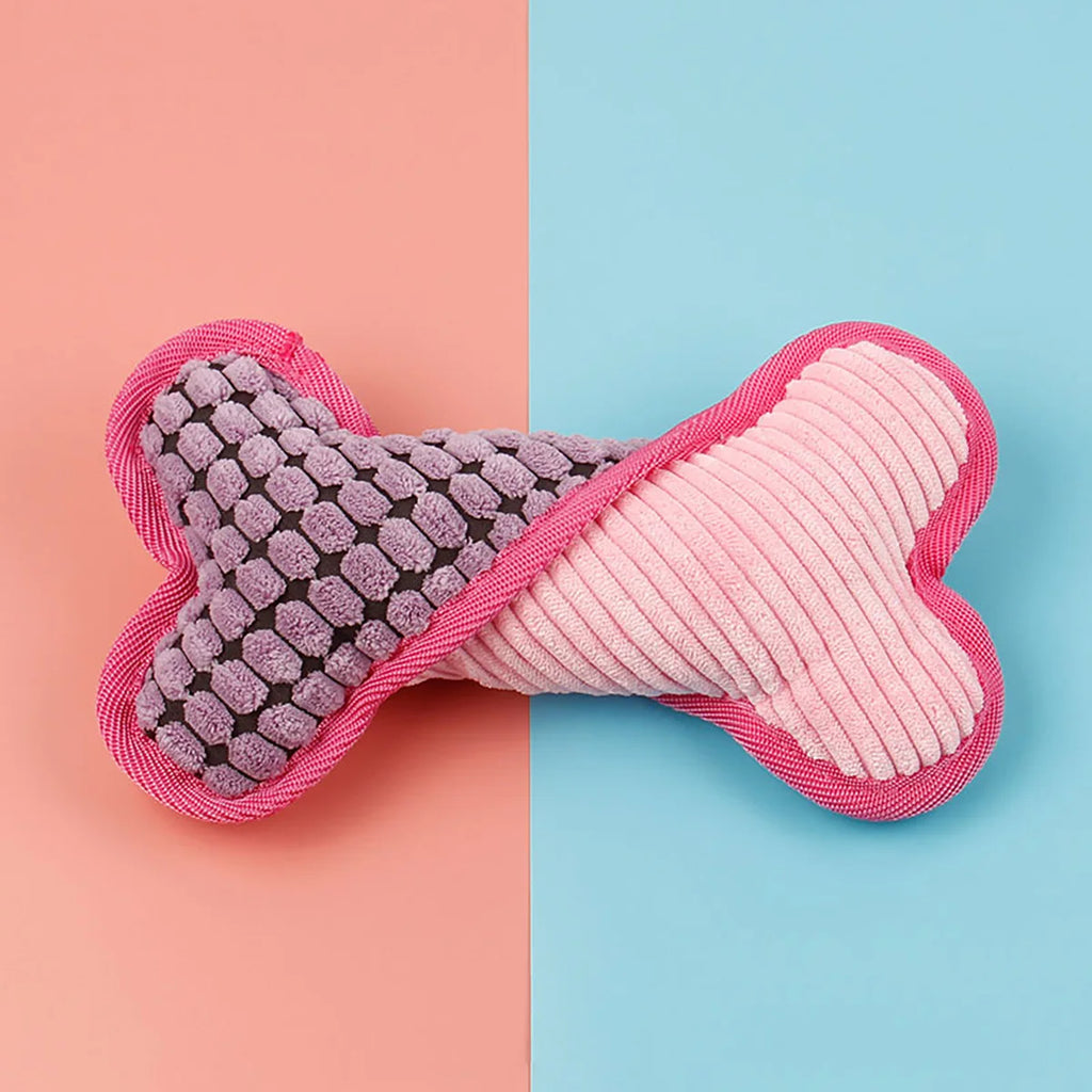 Bone shaped dog toy with squeaker