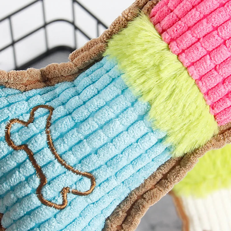 Bone shaped plush squeaky dog toy